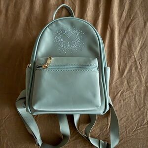 Mini Women's Backpack in Light Aqua with Butterfly Accent